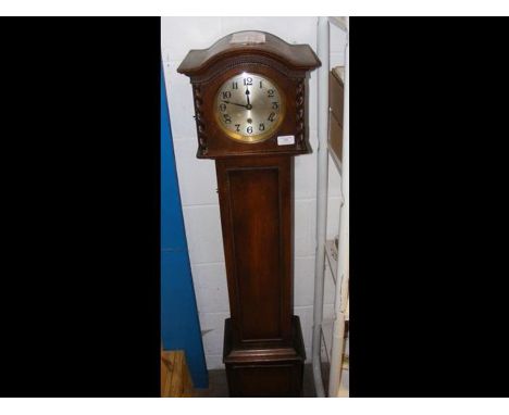 A circa 1940's Grandfather clock in oak longcase 