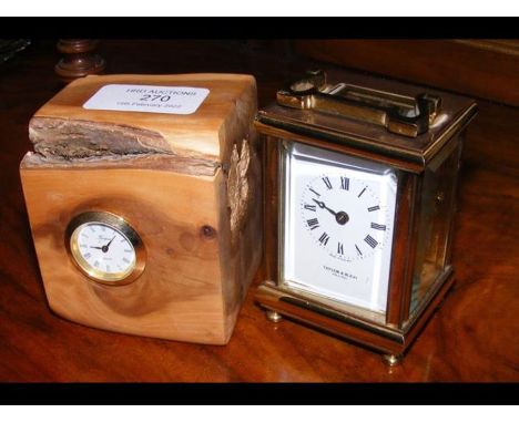 A military carriage clock - 8cms high, together with one other