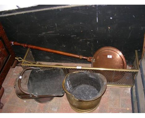 A pierced brass fire fender, coal scuttle, bed warmer, etc. 