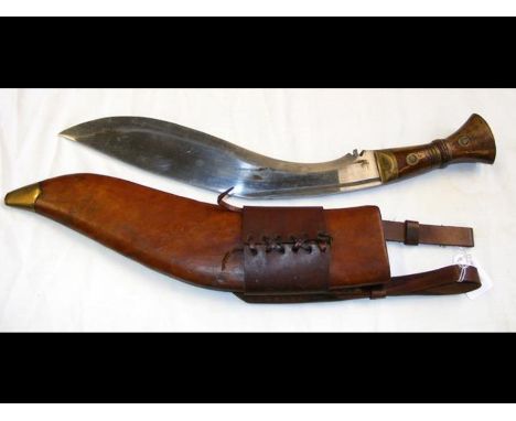 A WWII period Gurkha Army Kukri knife with original bound leather scabbard