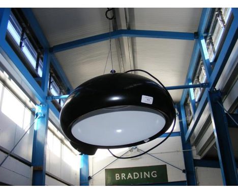 A retro circular light fitting 
