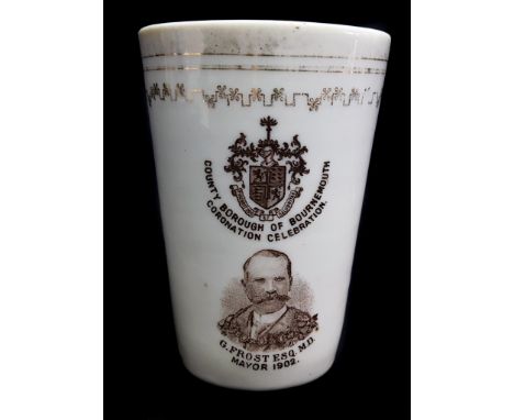 An unusual Commemorative porcelain beaker, marked 'Made Abroad' probably German, printed in brown with arms of the County Bor