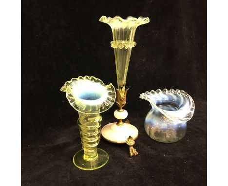 Three Victorian glass vases, comprising: money purse form posy vase with blue opal stripes; trumpet vase of uranium yellow wi