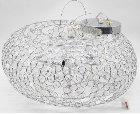 A modern ceiling light fitting of compressed circular form and wirework construction with faux crystal decoration, height 23c