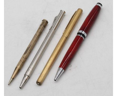 A fountain pen, having a gilt fluted cap and barrel, stamped Montblanc Germany; together with a German yard-of-lead propellin