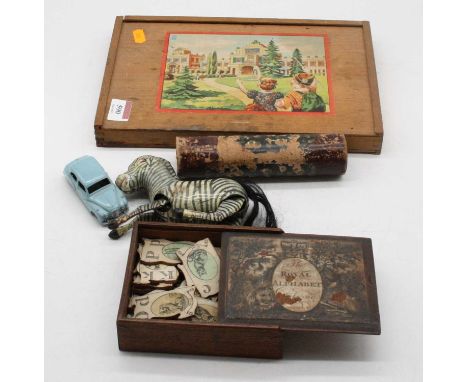 A collection of miscellaneous items, to include Dinky Toys diecast model of an Austin Somerset, clockwork tinplate model of a