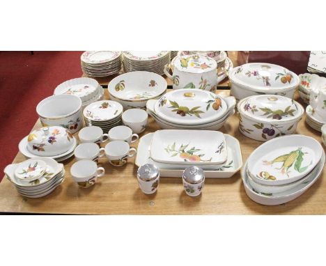 An extensive collection of Royal Worcester oven-to-table wares, in the Evesham pattern, to include tureens and covers, flan d