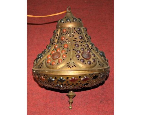 A Moroccan style pierced brass ceiling light pendant