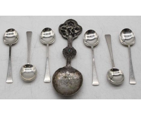 A Chinese white metal spoon, having engraved bowl, flower head stem, and pressed terminal in the form of a dragon, length 13c