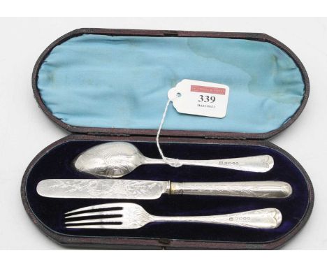 A late Victorian silver three-piece christening set, comprising fork, knife and spoon, all with engraved decoration and in fi