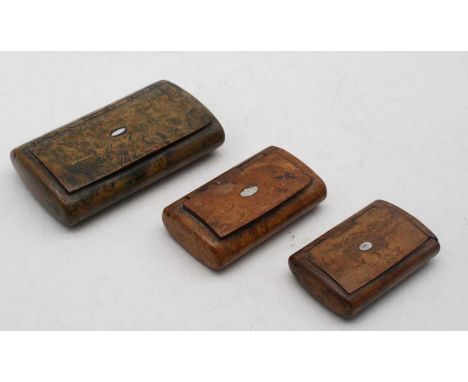 A 19th century burr yew pocket snuff box, of hinged oval form with mother of pearl cartouche; together with two other similar