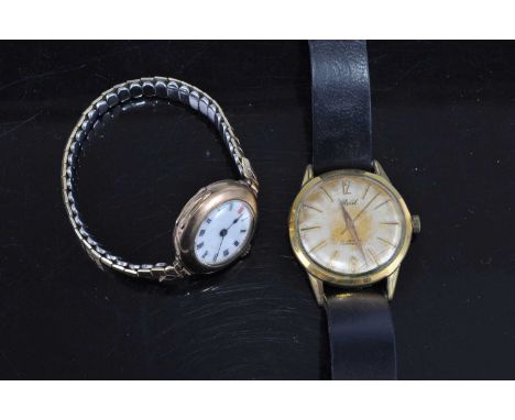 A vintage lady's 9ct gold cased manual wind wristwatch; together with a gent's Reid gold plated mechanical wristwatch (2) 