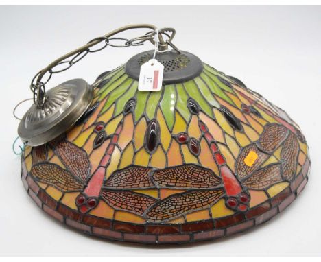 A reproduction Tiffany style leaded glazed ceiling light fitting of domed form, decorated with dragonflies.