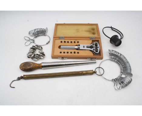 A collection of jewellers tools, to include watch case back remover, various ring sizers, loupe etc