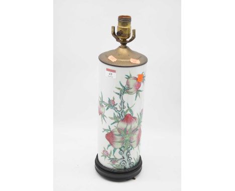 A reproduction Chinese style porcelain table lamp base of cylindrical form, enamel decorated with fruit and flowers, height 4