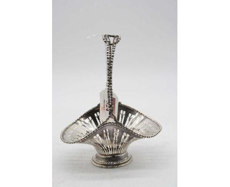 A George V silver sweetmeat dish of pinched oval form with beaded handle and pierced decoration, maker William Hair Haseler, 