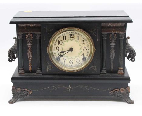 A Victorian simulated slate mantel clock, of architectural form, having a circular dial with Arabic numerals and eight day mo