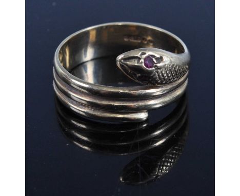 A 9ct gold snake ring, having ruby set eyes, 4g, size P/Q