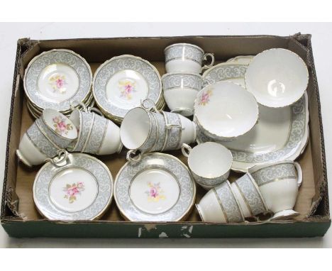 A Royal Crown Staffordshire part tea service having floral decoration within grey border, heightened in gilt having printed m