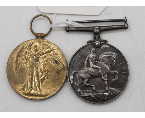 A pair of WWI medals, being British War medal and Victory medal, naming 18739 PTE. G. W. HOWE. SUFF. R. (2)