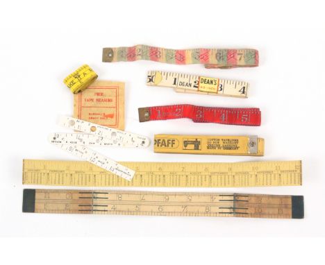 Eight 'economy' tape measures, comprising a printed card example, 'The Foot-Rule Calendar for 1887', another advertising 'Bor