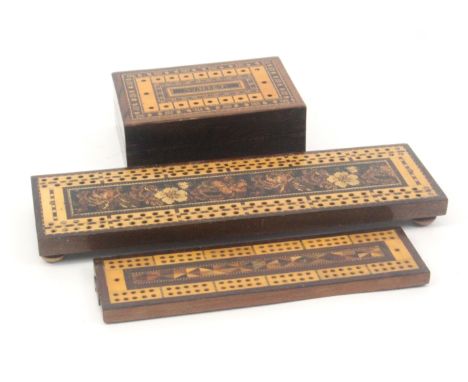 A Tunbridge ware whist box and two cribbage boards, the rosewood rectangular box with marker panels and geometric mosaic with
