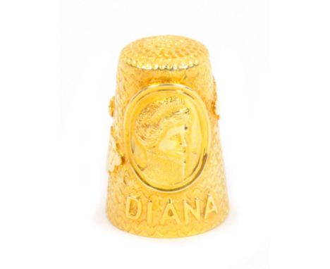 An American limited edition heavy gauge gold thimble to commemorate 'Diana', the ground of hearts embellished with oval portr