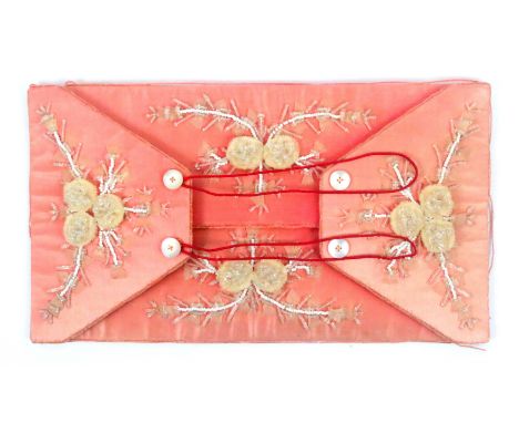 A fine silk netting case, circa 1840, rectangular, in pink silk and of envelope form, decorated in clear and white floral bea