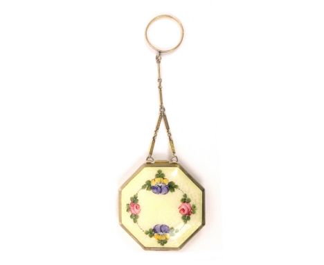 A gilded metal and enamel compact on finger ring, circa 1930, the decorated ring with solid link chain to an octagonal compac