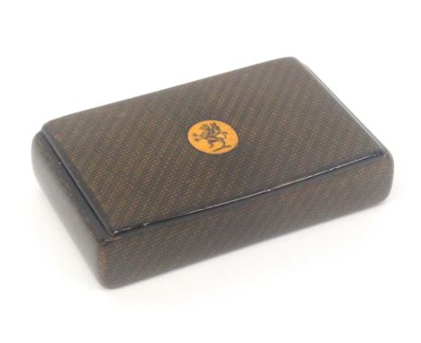 A Scottish sycamore snuff box, wooden hinge, rectangular, the lid with penwork oval of a winged dragon raised on one leg and 