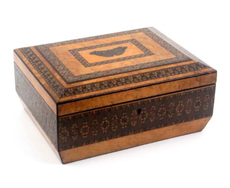 A Tunbridge ware burr maple sewing box, of sarcophagol form, the sides with a broad band of stick ware, the lid with inset mo