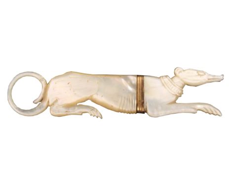 A Palais Royal mother of pearl needle case in the form of a recumbent greyhound, curled tail, gilt metal ferrule, 8.5cms. 