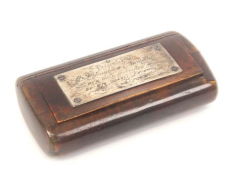 A burr wood snuff box of oval section, the lid with an engraved silver plaque 'Presented to Mr. F. Singleton, Nut Well, as a 
