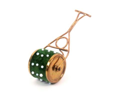 A gilt brass novelty pin cushion in the form of a garden roller, green velvet roller, Rd. Number stamped to one side, 10cms h