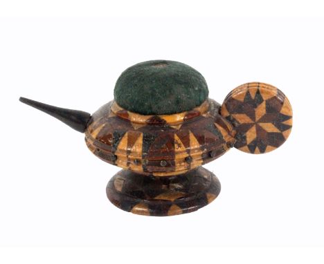 A good Tunbridge stick ware teapot pin cushion and wheel, rosewood spout, velvet cushion, disc form handle, 7.5cm wide.&nbsp;