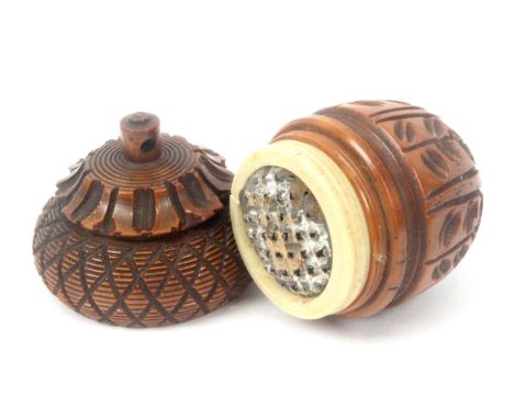 A coquilla nut acorn form nutmeg grater, with engine turned decoration, bone screw upstand with metal grater, 6.5cms.&nbsp; 