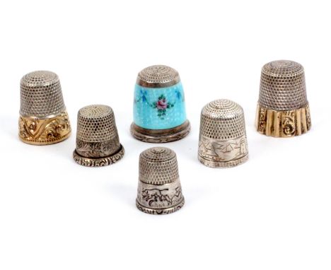 Six American 'Sterling' and similar thimbles, including an example in floral enamel, small chip to enamel at top, internal ap