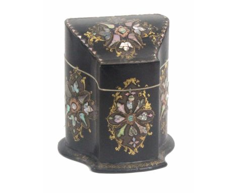 A papier mache and pearl inlaid sewing companion of serpentine knife box form, circa 1850, inlaid with geometric panels of pe