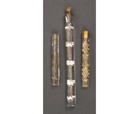 Three 19th Century Oxford lavender bottles, the largest with white enamel leaf decoration, complete with stopper, 20cms, and 