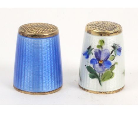 Two Norwegian silver gilt and enamel thimbles, comprising an example decorated with 'midnight violet' by David Anderson, inte