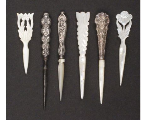 Six stilettos, comprising three in mother of pearl, probably Palais Royal, two pierced and carved with leaves or flowers, lar