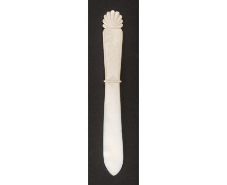 A mother of pearl letter knife, with leaf carved handle, small chip to edge of blade, 17cms.&nbsp; 