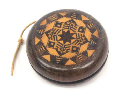 A rare rosewood Tunbridge ware yoyo, each side with a bold circular stick ware panel, 7.5cms dia.&nbsp; &nbsp; &nbsp; From th