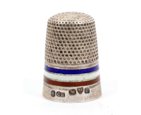 A good example of a silver and enamel thimble 'A stitch for the red, white and blue', red, white and blue enamel frieze over 