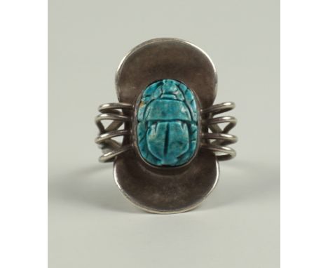 Ring mit hellblauem Stein "Skarabäus", 835er Silber, Art déco Gew.8,52g, Stein mit kl.Randchip, verzierter Ringkopf, H.2,95cm