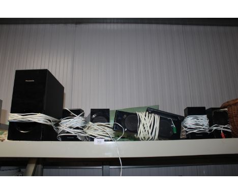 A quantity of various Panasonic speakers and remote control