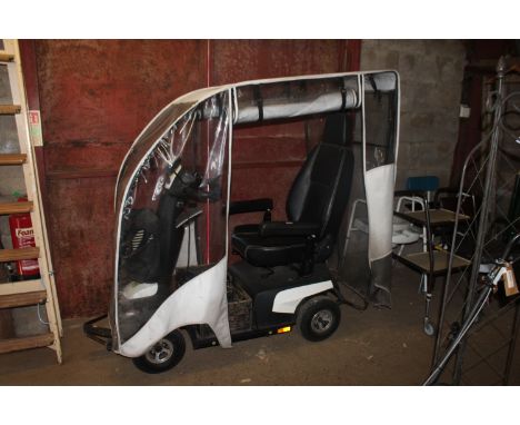 A Comet Pro mobility scooter with cover