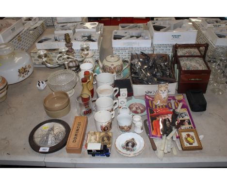 A quantity of various silver plated and other cutlery; an onyx style table lamp; a cantilever sewing box and contents; commem