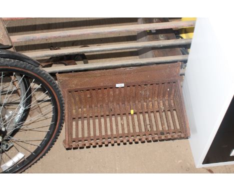 A cast iron fire grate