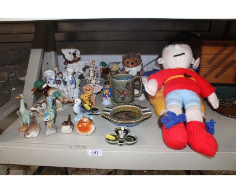 A collection of various figurines to include Royal Copeland pagan style birds; stuffed toys; Wade ornaments etc.